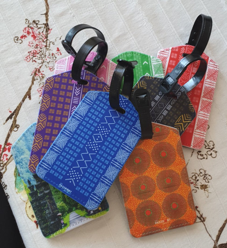 The Passport Hustle Mud Cloth Luggage Tags Mudcloth in Color with secure strap. We have 6 different mud cloth designs that have matching luggage covers and neck pillows.